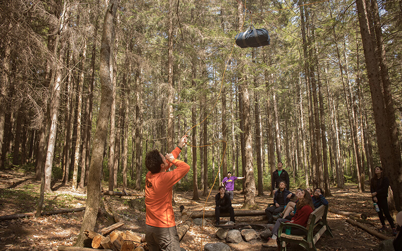 Hang your food to avoid encounters with critters when camping.