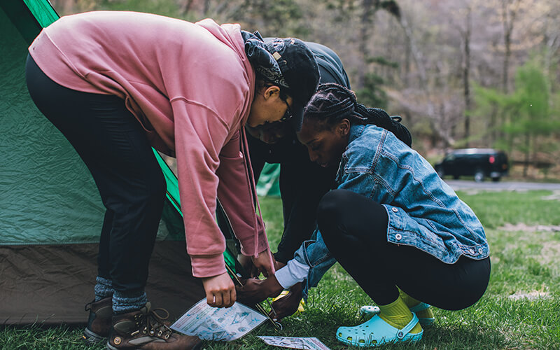 Always stake tents directly into the ground .