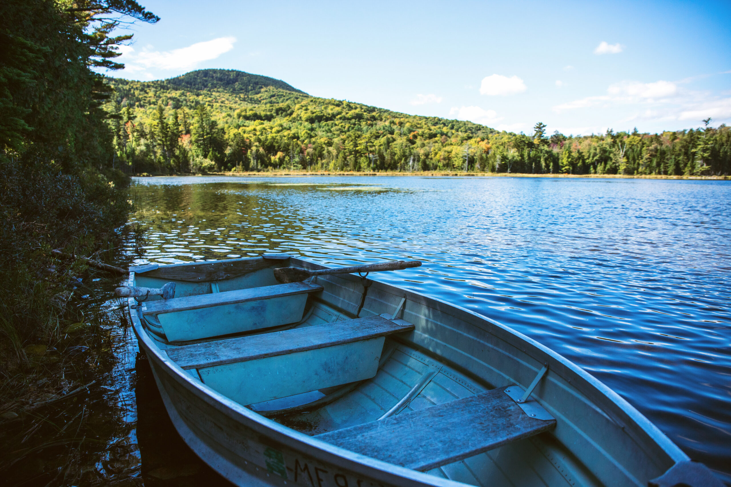 Boat in water on clear summer day