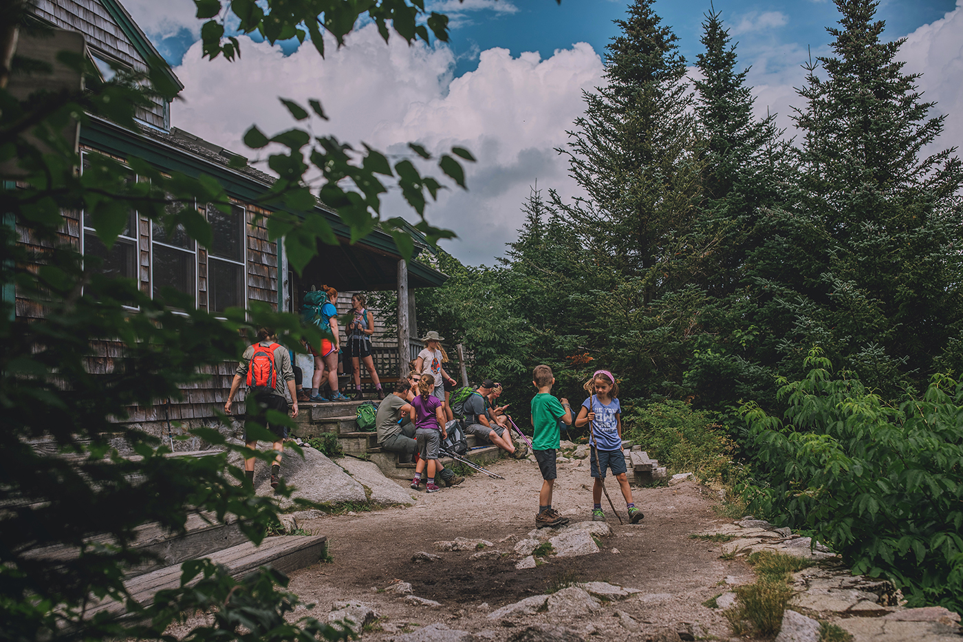 Families outside Zealand Falls Hut