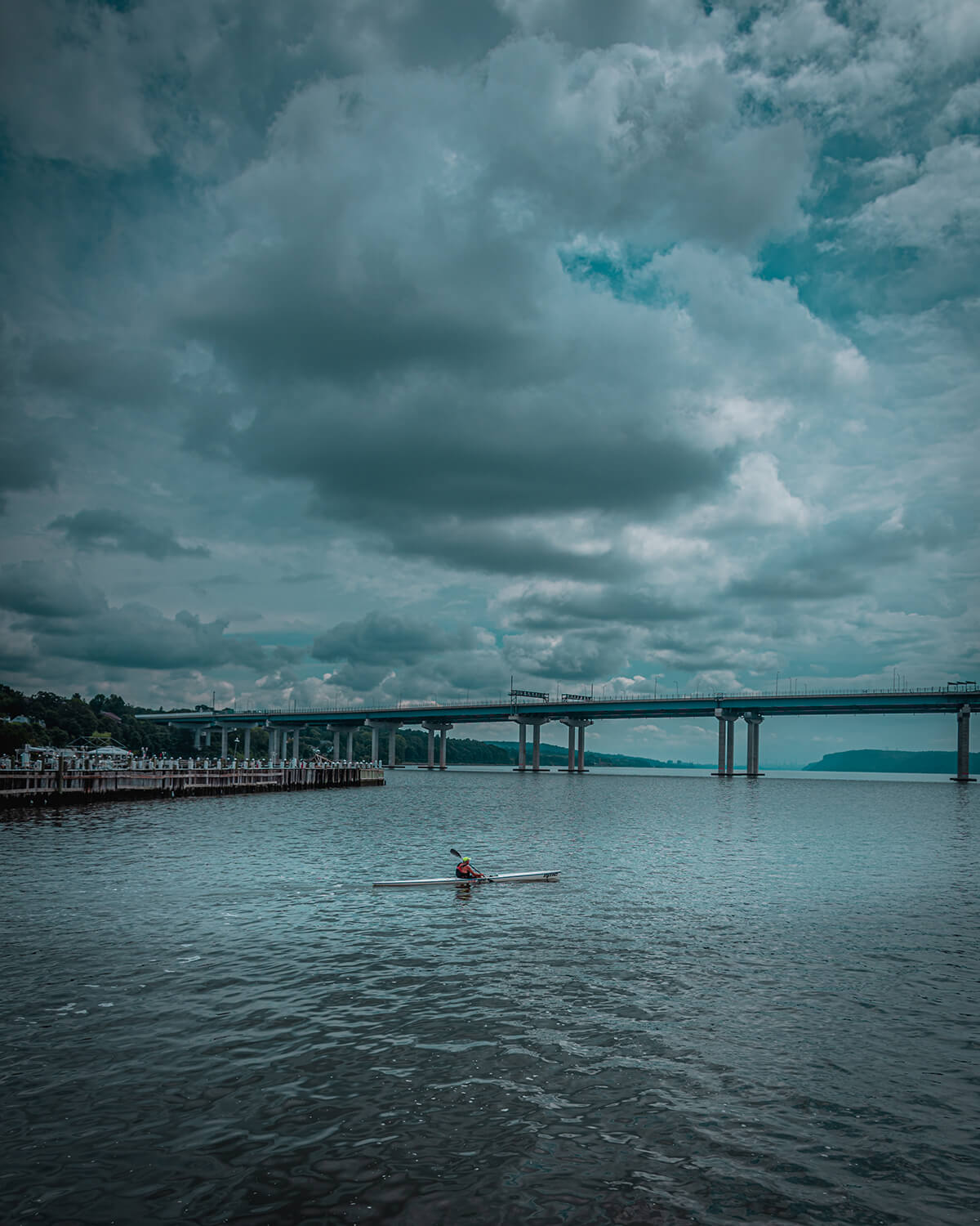 kayaker paddling near Scenic Hudson River Walk Park, Tarrytown, New York