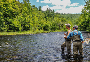 2 men fly fishing