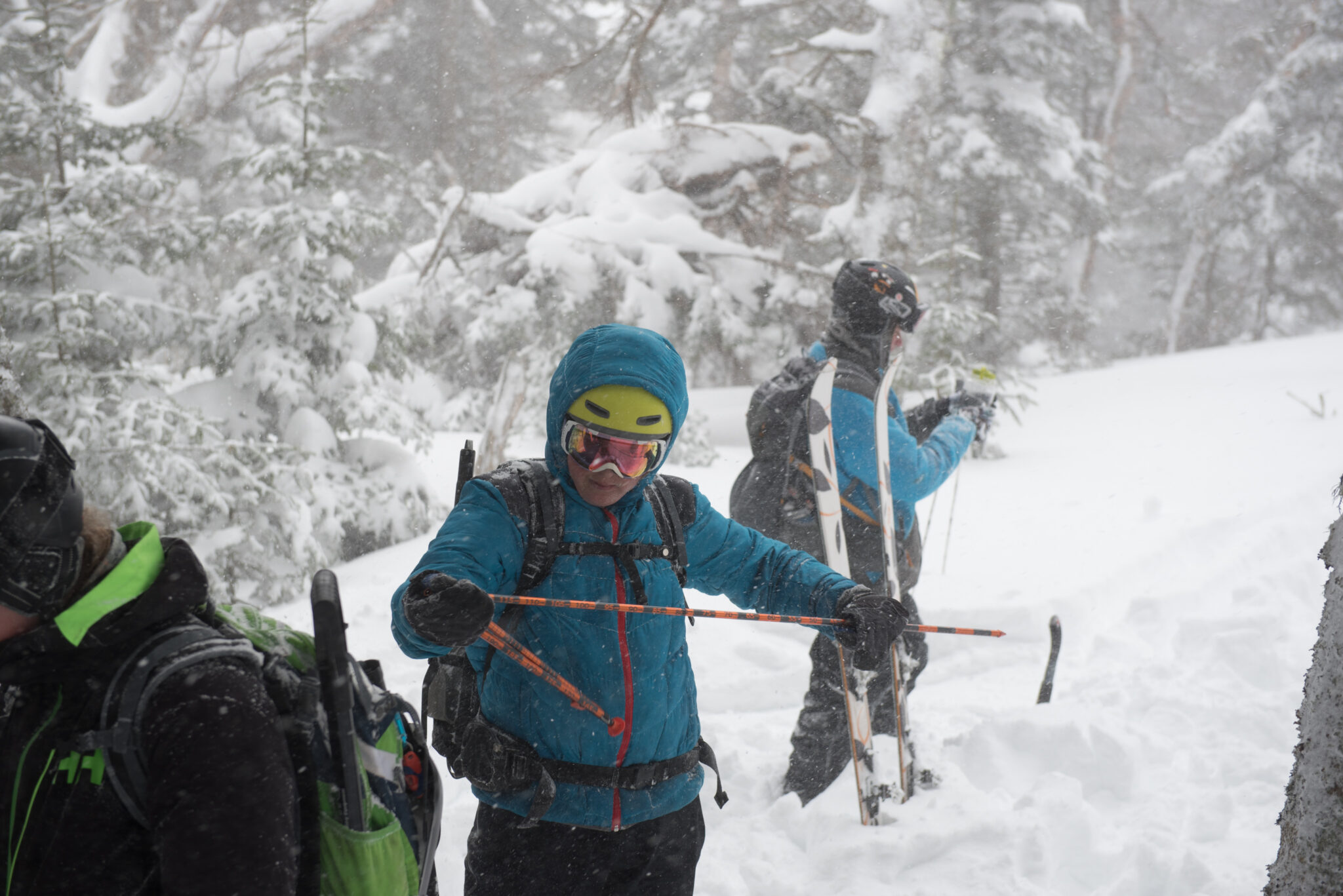 Joe KlementovichA skier uses an avalanche probe to make a snow observation.