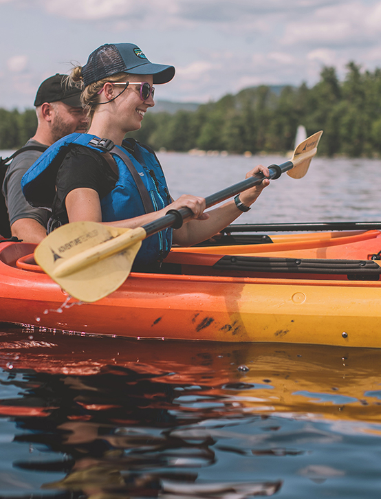 Kayakers paddling on Conway Lake, NH