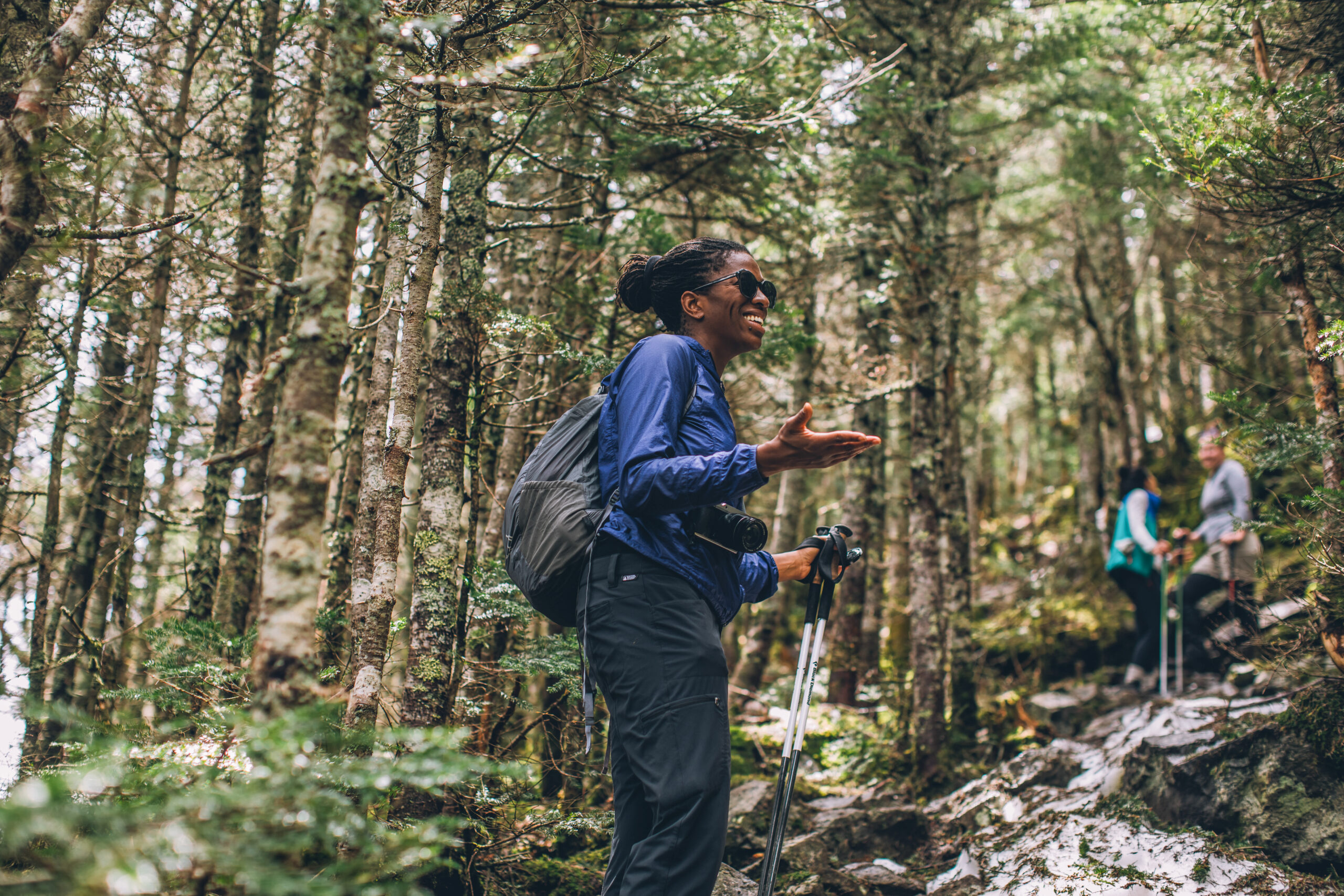 woman hiking in the White Mountain National Forest.